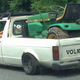 Illustration for article titled This VW Caddy Carrying A Tractor Just Might Make You Like Stanced Cars